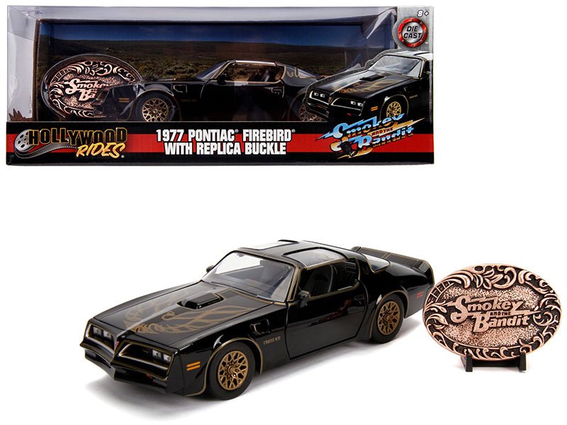 1977 Pontiac Firebird Trans Am Black with Replica Buckle "Smokey and the Bandit" (1977) Movie "Hollywood Rides" Series 1/24 Diecast Model Car by Jada free shipping USA
