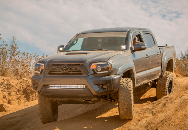 Cali Raised LED Cali Raised 05-15 Toyota Tacoma Low Prof Ditch Light Brackets Kit W/ Amber Backlight - Tall CR2861