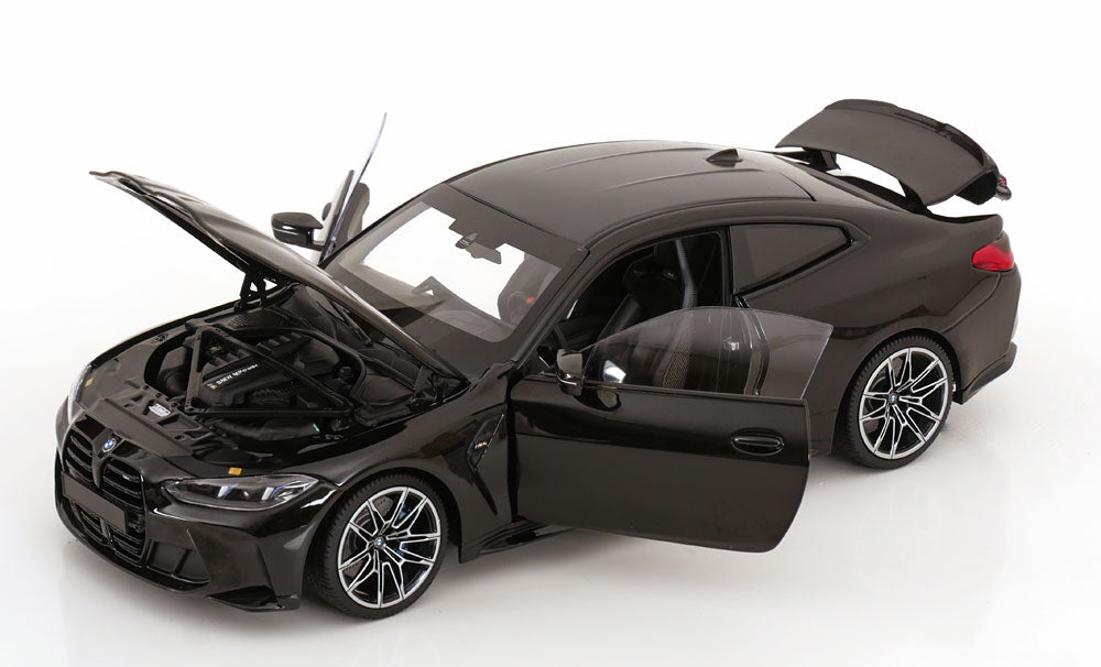 Minichamps 2024 BMW M4 Coupe (G82) w/ Black Carbon Roof Black Metallic 1:18