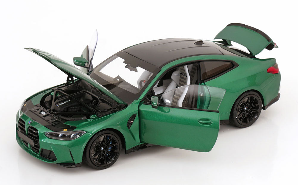 Minichamps 2024 BMW M4 Coupe (G82) w/ Carbon Roof Isle of Man Green Metallic 1:18