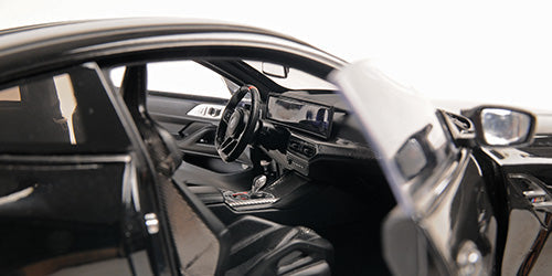 Minichamps 2024 BMW M4 Coupe (G82) w/ Black Carbon Roof Black Metallic 1:18