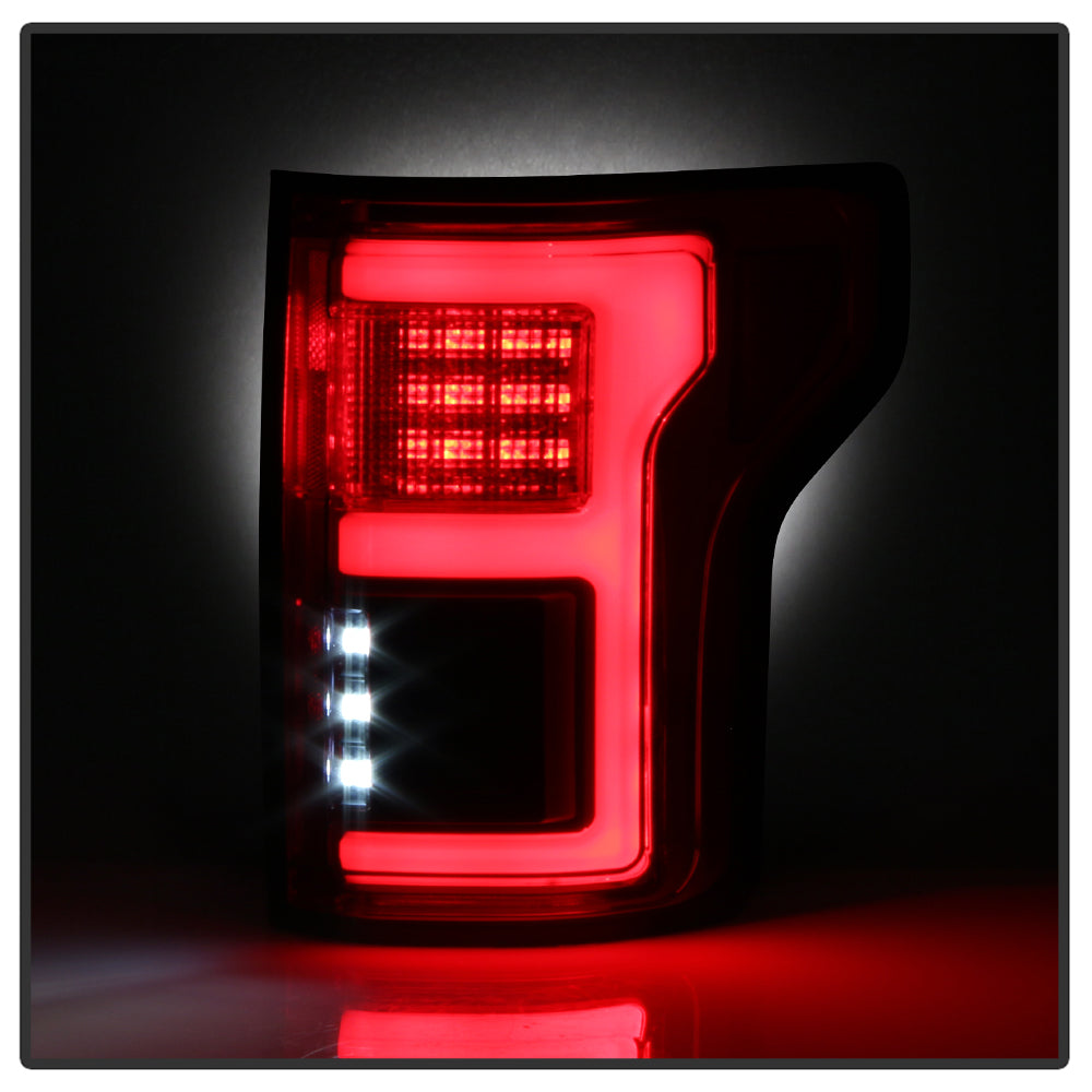 Spyder 15-18 Ford F-150 LED Tail Lights (w/Blind Spot) - Red Clear (ALT-YD-FF15015BS-LBLED-RC) 5085320