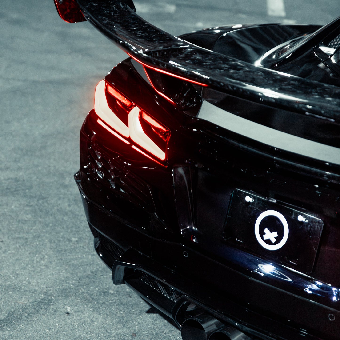 Installed C8 Corvette ZR1 ZTK style forged carbon hood and chassis mounted rear wing
