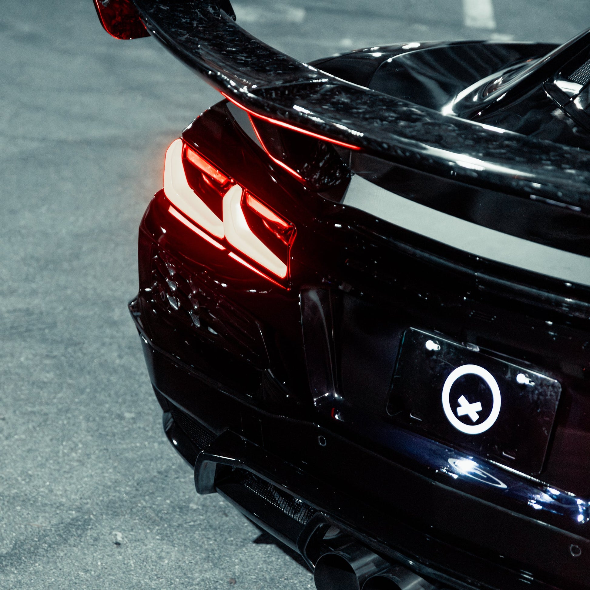Installed C8 Corvette ZR1 ZTK style forged carbon hood and chassis mounted rear wing
