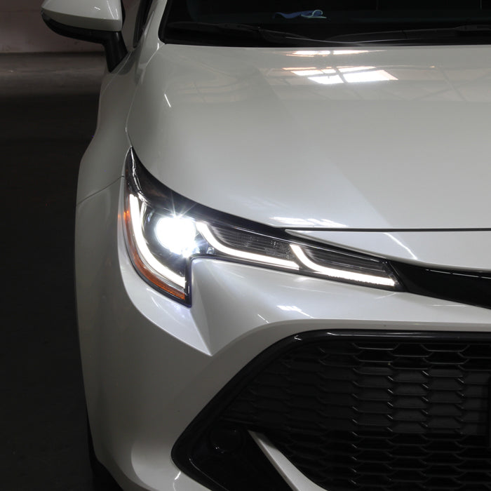 xTune US Built Toyota Corolla 18-20 L LE LED Proj Headlights-SE Style Black PRO-JH-TCOL20LUS-LED-BK 9949326