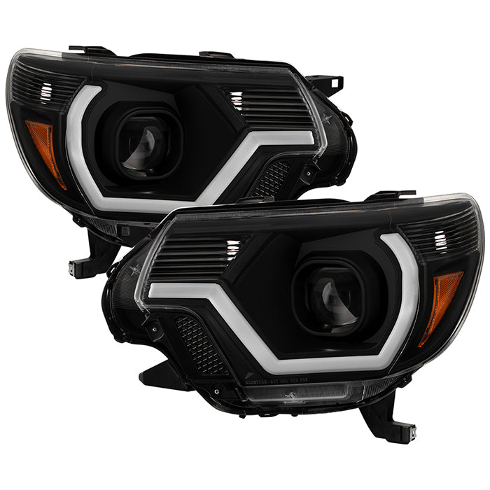SPYDER xTune 12-15 Toyota Tacoma Projector Headlights w/ Light Bar - Black (PRO-JH-TTA12-LB-BK) 9050602
