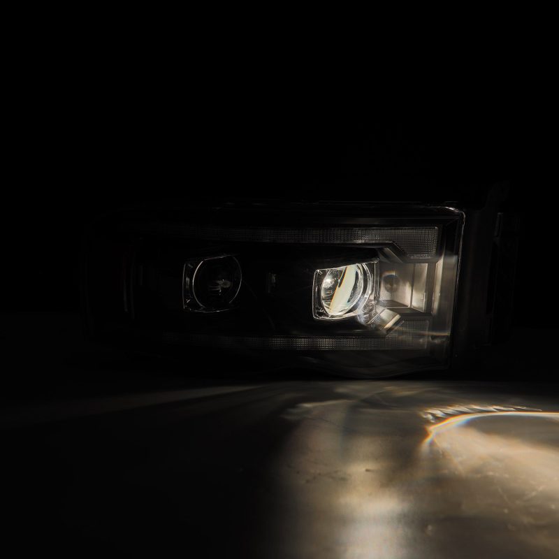 AlphaRex 02-05 Dodge Ram 1500 PRO-Series Projector Headlights Plank Style Black w/Seq Signal 880570 *Discontinued