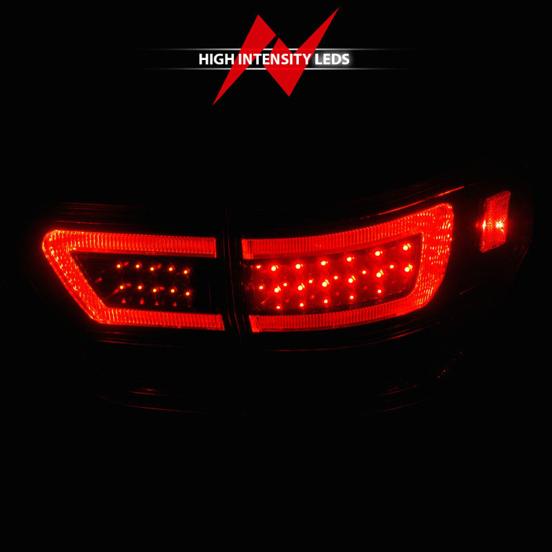 ANZO 11-13 Jeep Grand Cherokee LED Taillights w/ Lightbar Black Housing/Clear Lens 4pcs 311439