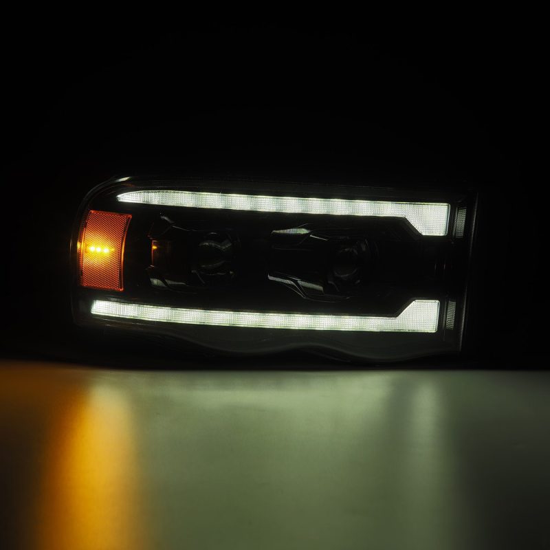 AlphaRex 02-05 Dodge Ram 1500 LUXX LED Proj Headlights Alpha Black w/Activ Light/Seq Signal 880569 *Discontinued