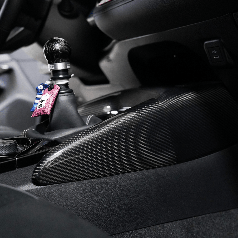 JDMuscle [23-25 GR Corolla, 19+ Hatch] Carbon Fiber Center Console Cover