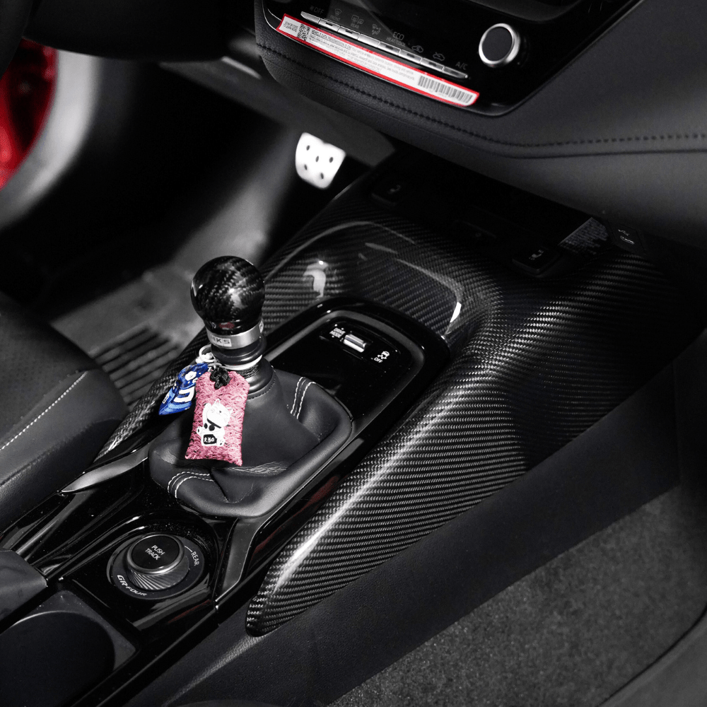 JDMuscle [23-25 GR Corolla, 19+ Hatch] Carbon Fiber Center Console Cover